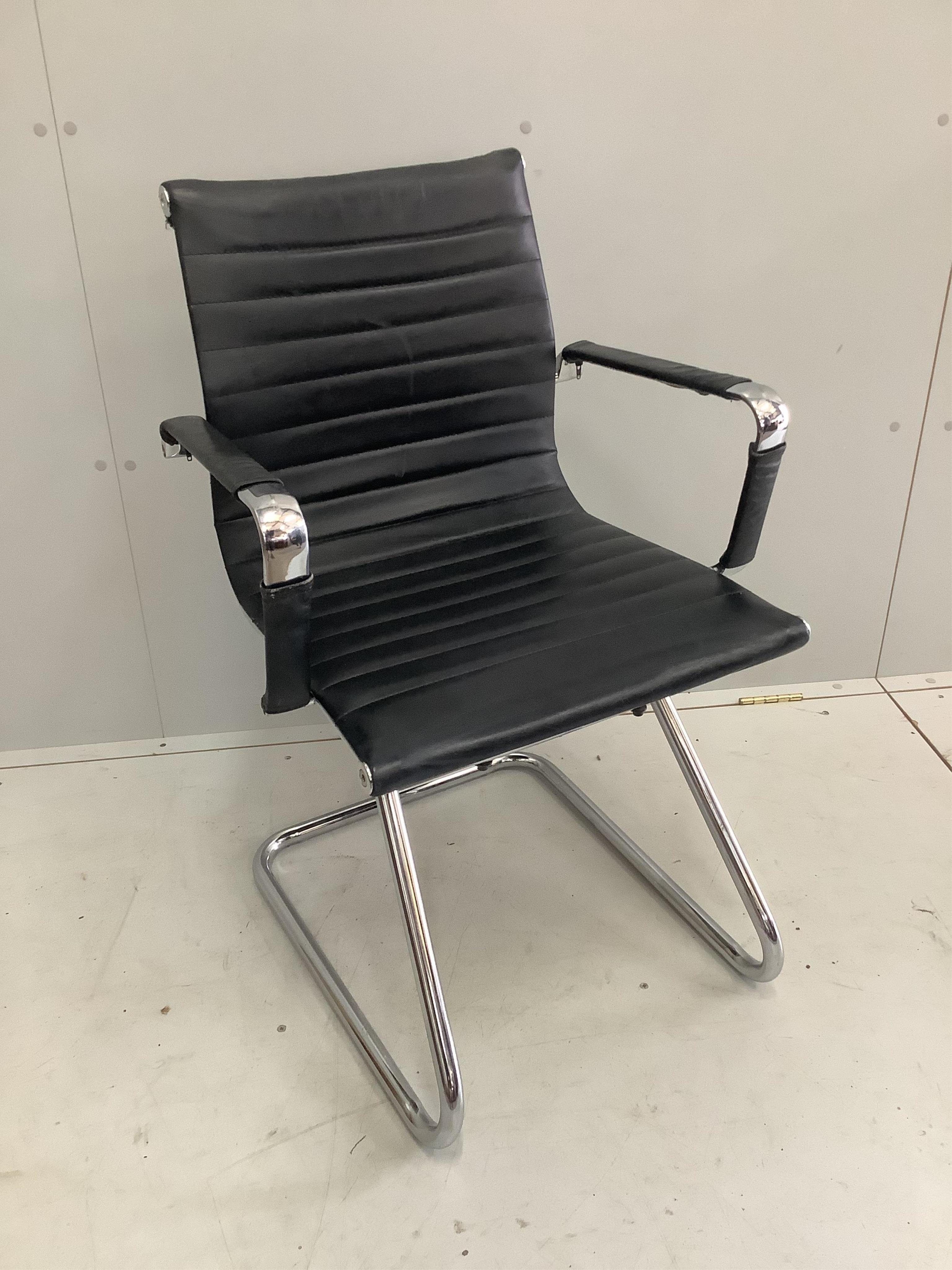 Seven chrome and black leather elbow chairs, width 57cm, depth 57cm, height 89cm. Condition - poor to fair